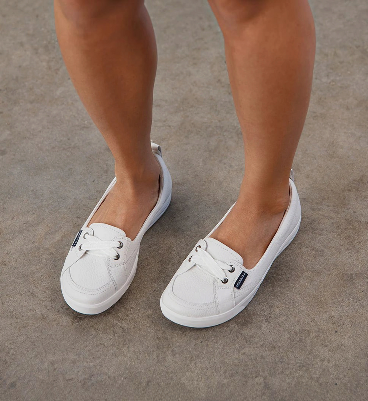 House of Florian FRANKIE4 Sophie white tumbled leather slip-on shoes with supportive footbed on a model