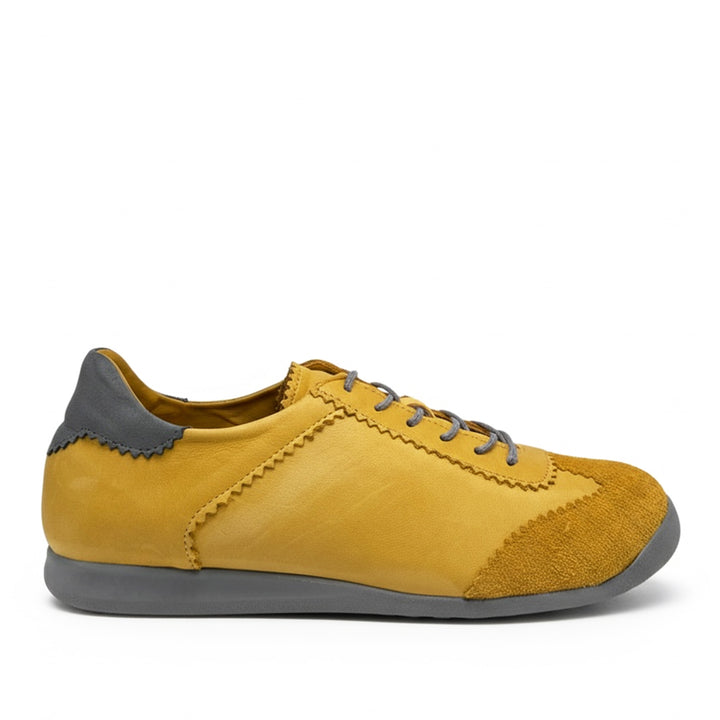 Yellow sneaker with gray accents