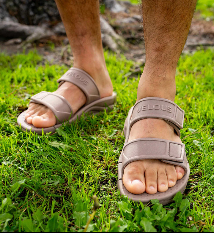 House of Florian Active Two Strap Taupe sandals with adjustable straps and cushioned sole, worn on grass.