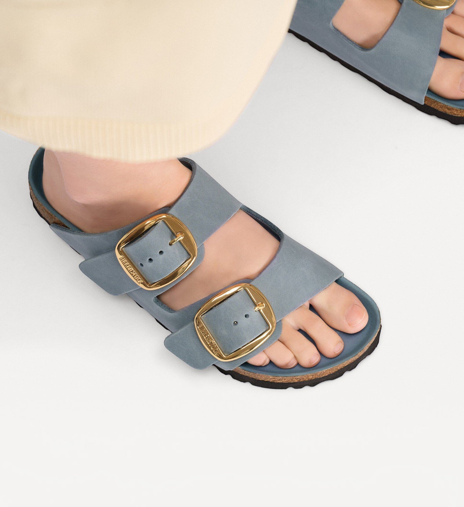 House of Florian Arizona Big Buckle sandals in basalt grey oiled leather with large gold buckles on feet
