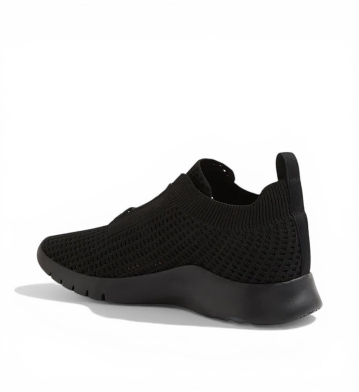 House of Florian Prisse XW black knit sneakers with a pull tab and black sole.