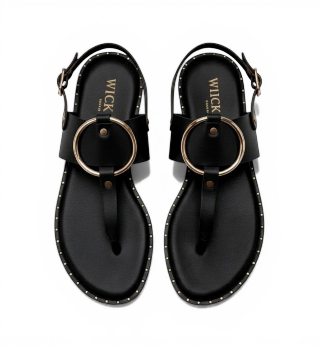 House of Florian Tegan Black leather flat sandals with gold ring detail and stud trim.