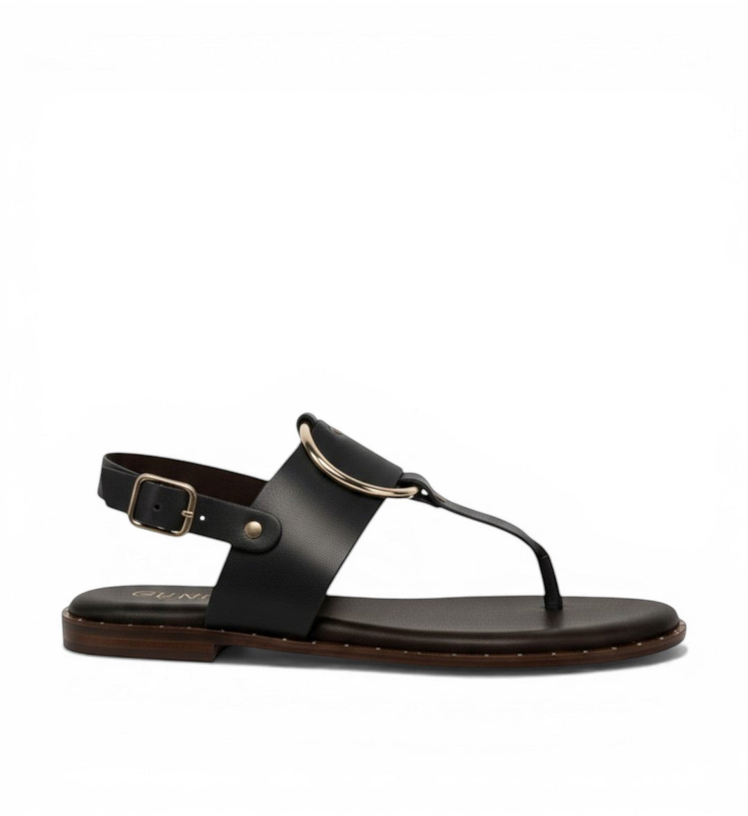 House of Florian Tegan black leather thong sandals with gold ring detail and adjustable ankle strap.