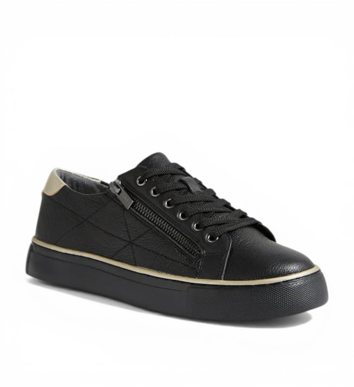 House of Florian black leather sneakers with side zip, quilted detail, and gold heel accent. Wide fit with removable footbed.