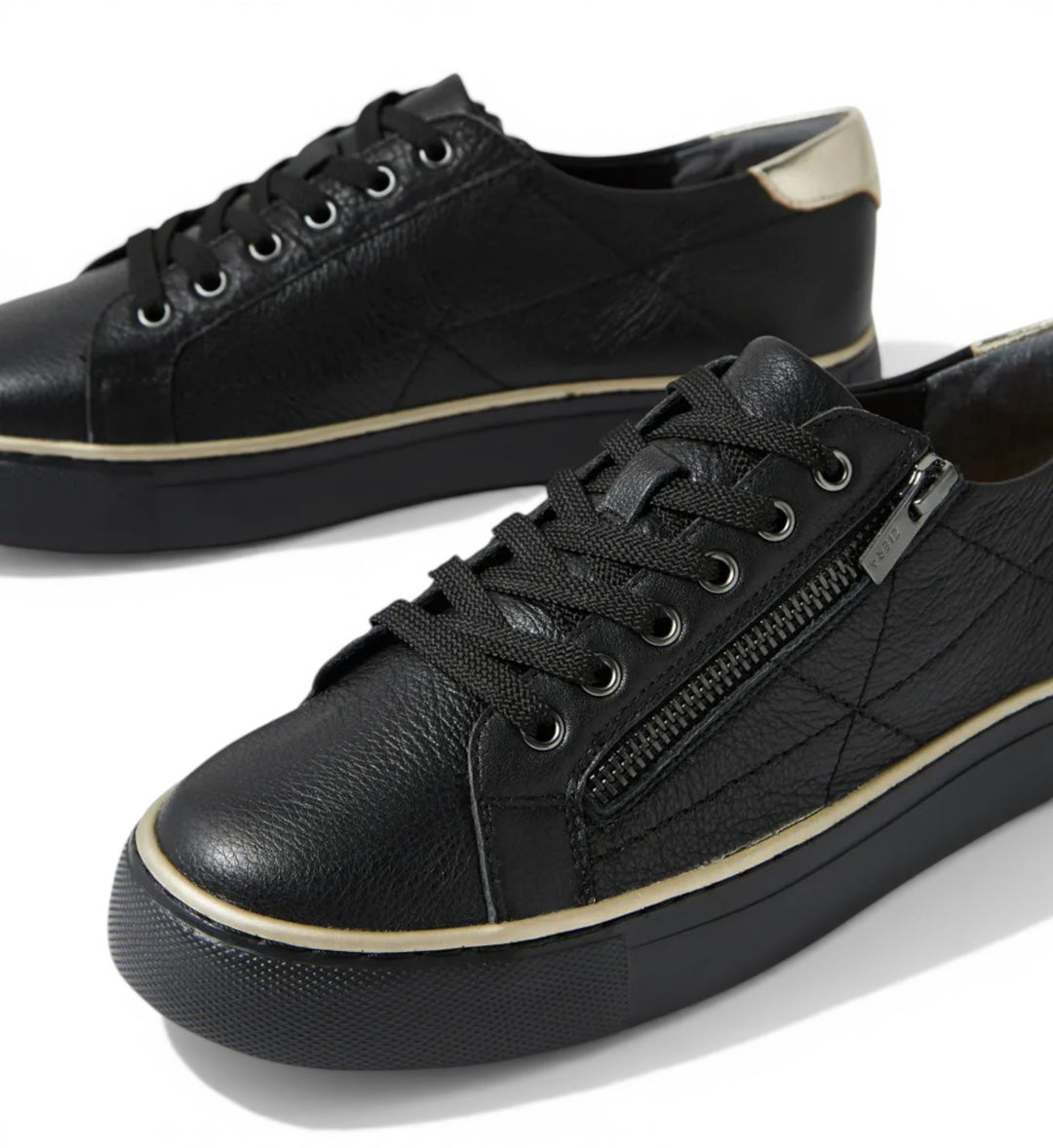 House of Florian black leather sneakers with side zip, lace-up front, and gold heel accent. Comfortable and stylish.