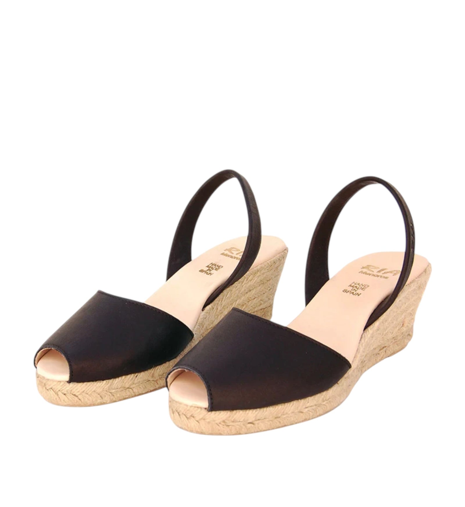 House of Florian black velvet wedge espadrilles with peep toe and slingback strap. Esparto rope sole.