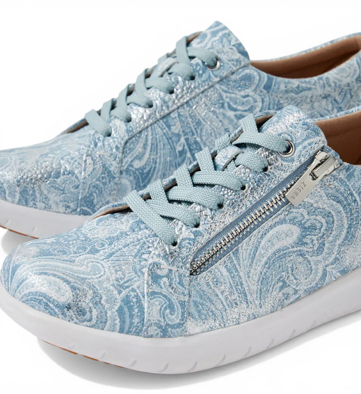 House of Florian Solar XW blue and silver paisley print slip-on sneakers with side zipper and laces.