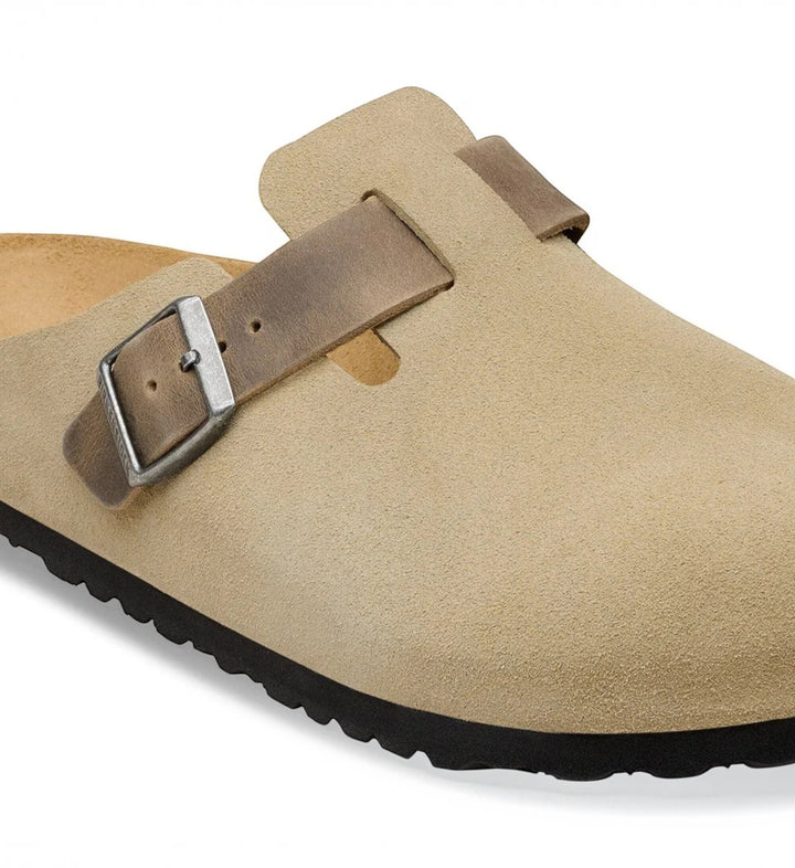 House of Florian Boston clog in faded khaki suede leather with an adjustable strap and metal buckle detail.