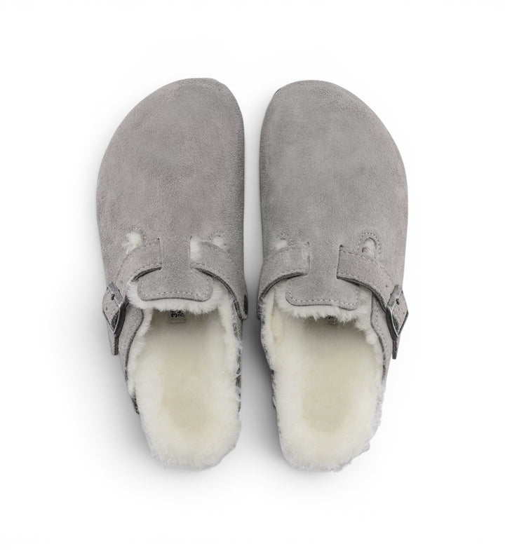 House of Florian Boston Shearling clogs in stone grey suede with buckle detail and cozy white shearling lining.