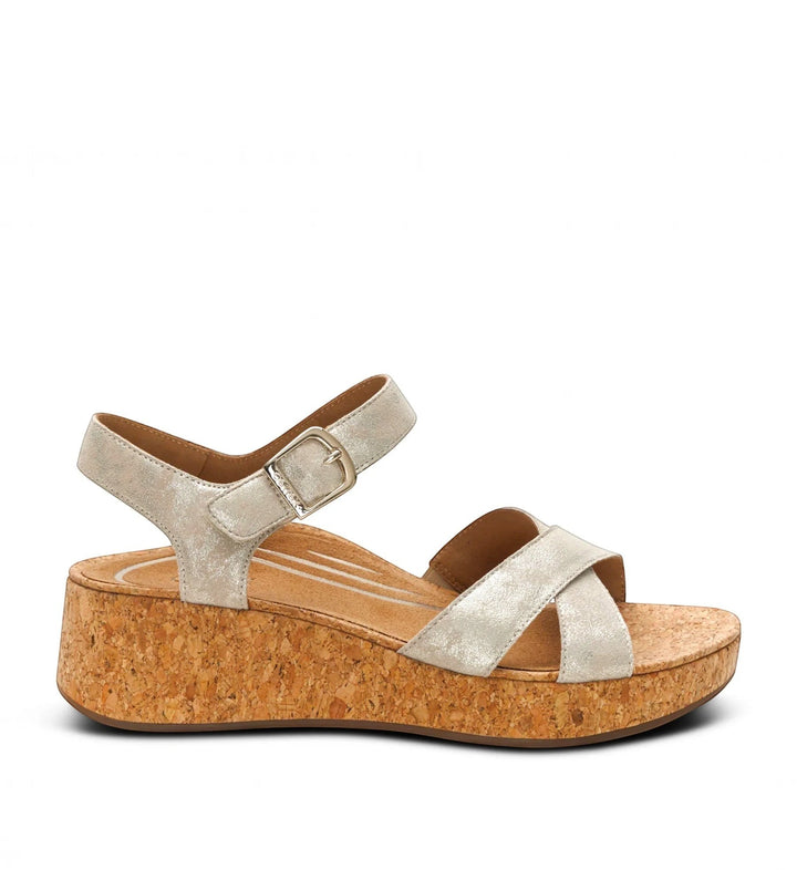 House of Florian Flora Champagne wedge sandals featuring metallic silver straps and a natural cork platform sole.