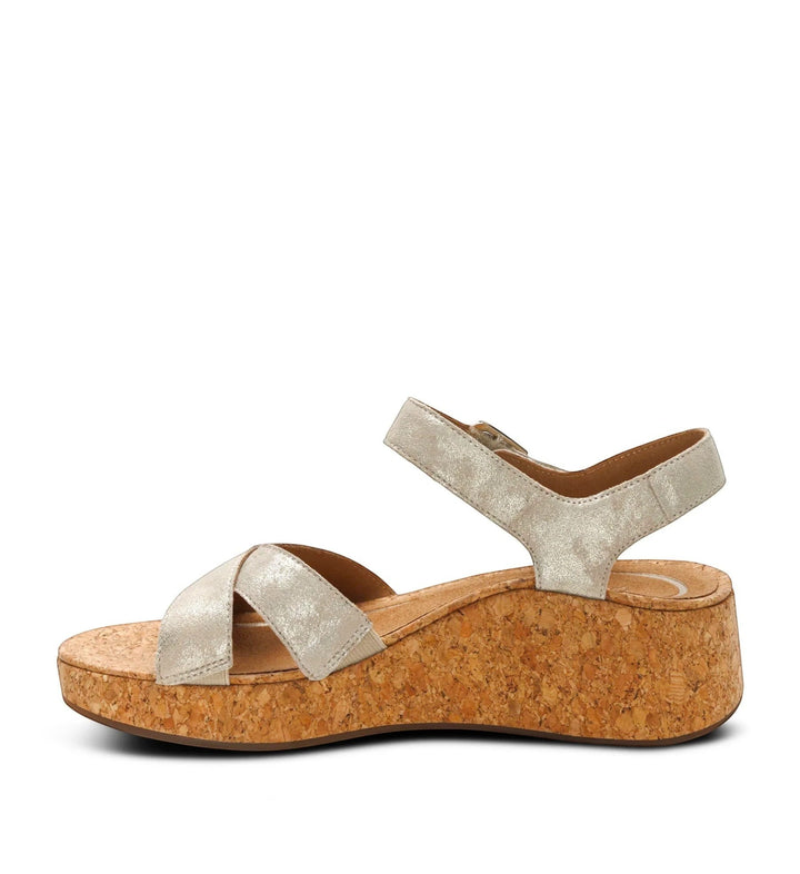 House of Florian Flora Champagne wedge sandals with metallic silver crossover straps and a natural cork platform sole.