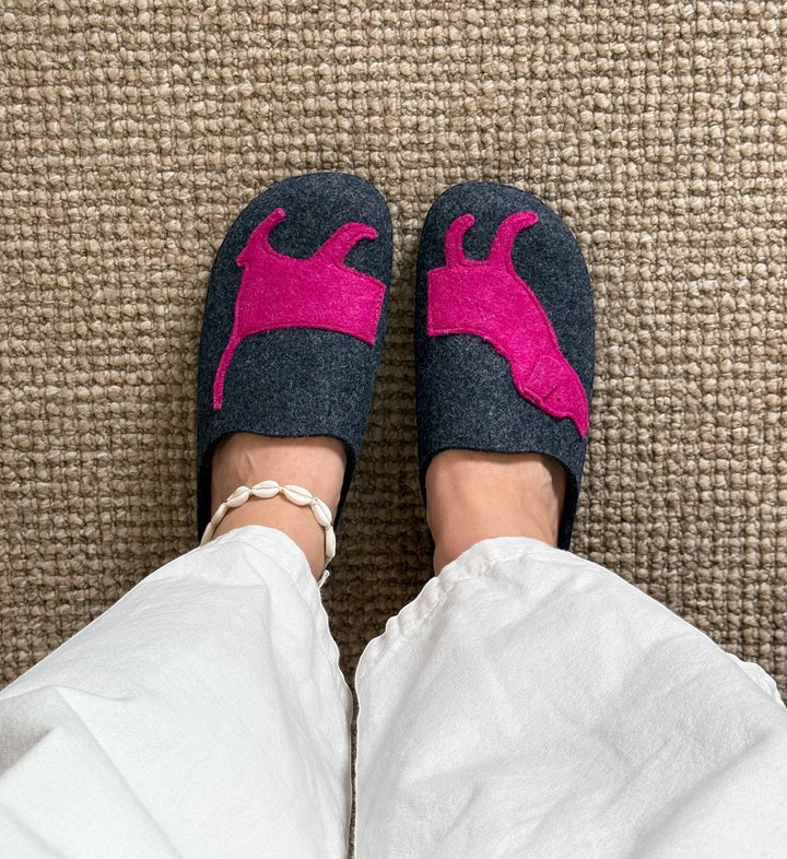 House of Florian DR. FEET charcoal wool felt slippers with a bright fuchsia dog applique worn on a textured carpet.