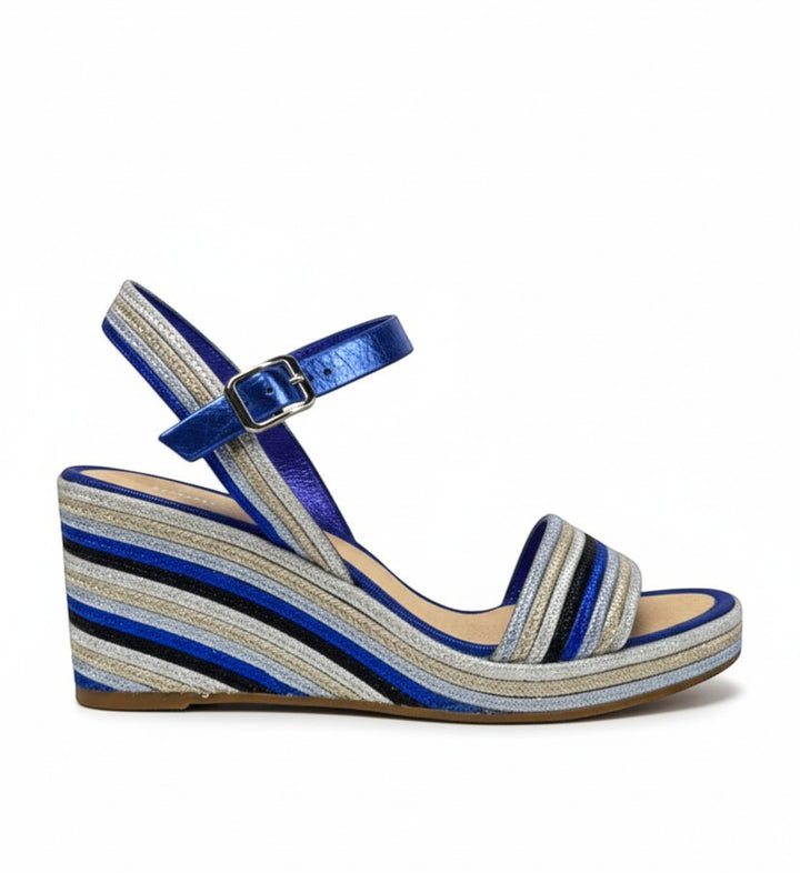 House of Florian Pelezet Cobalt wedge sandals with blue metallic ankle strap and striped wedge heel in blue, silver, and black.
