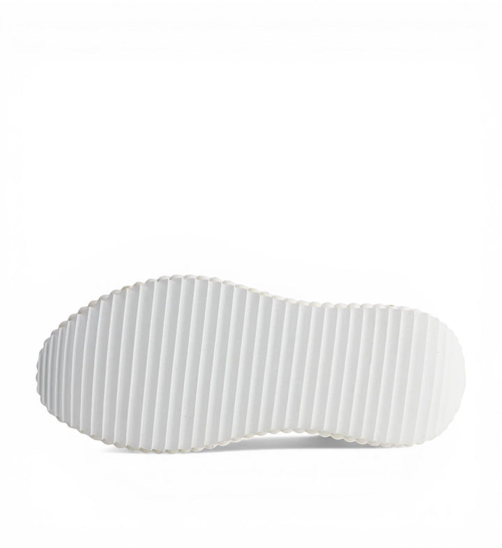 House of Florian Copen Leopard white rubber sole with deep grooves for traction.