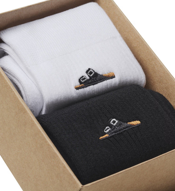 House of Florian 2 pack black and white cotton rib socks with embroidered sandal detail.