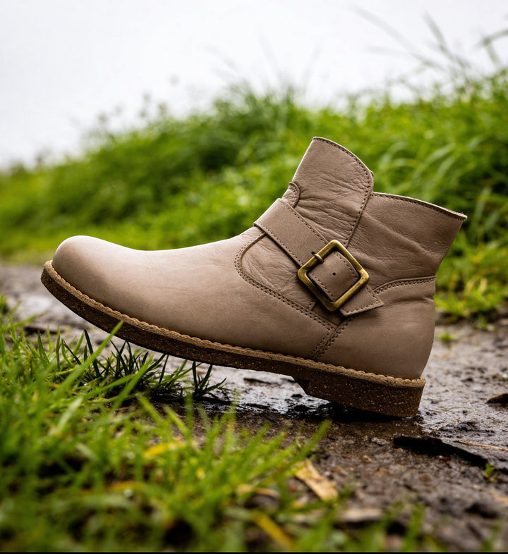 House of Florian Tadaka Dark Stone leather ankle boot with buckle detail and brass hardware.