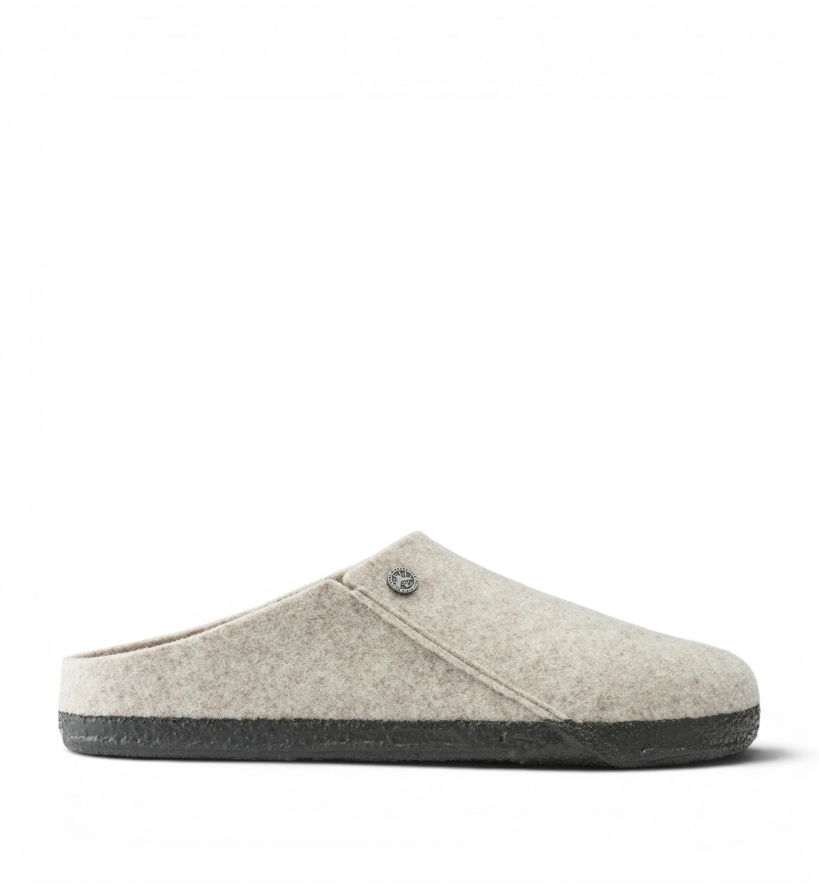 House of Florian Zermatt wool felt clog slipper in eggshell with a dark grey sole and a decorative button accent.
