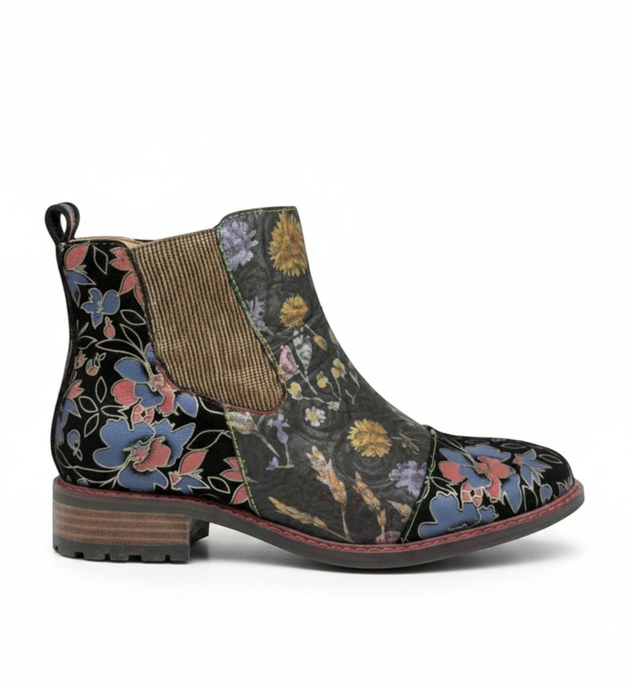 House of Florian Ercwino 02 Black ankle boots with floral print, brown elastic side panel, and side zipper.