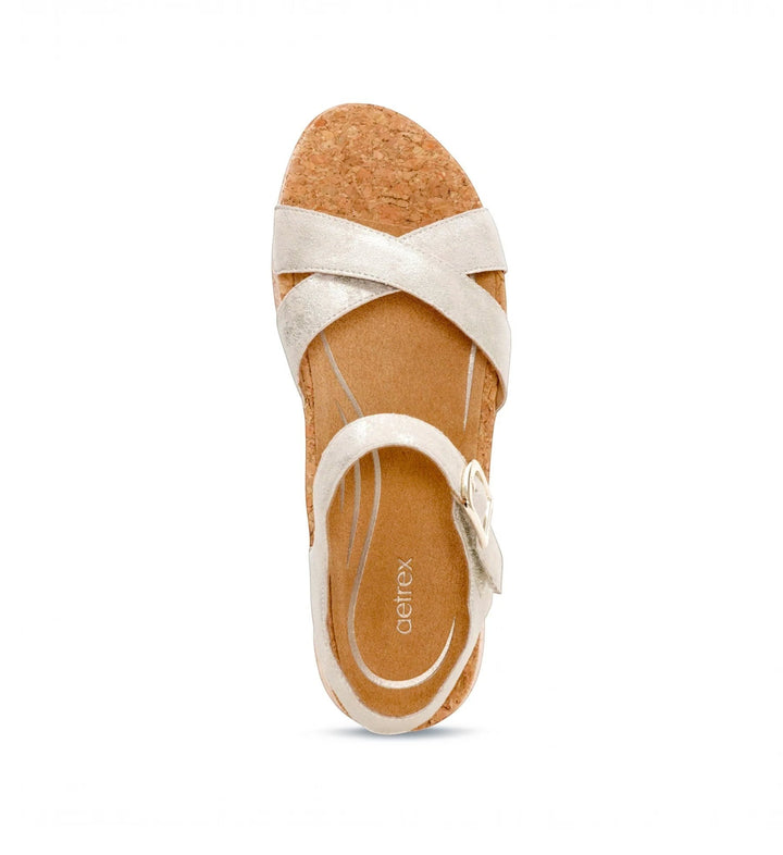 House of Florian Flora Champagne metallic silver sandal with a cork footbed and adjustable ankle strap