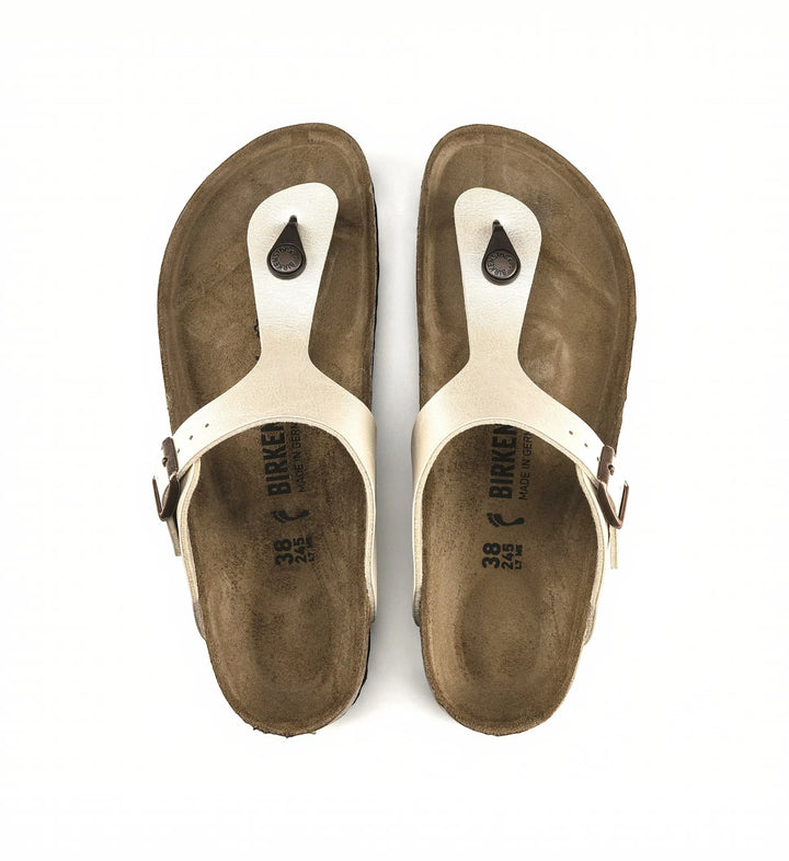 House of Florian Gizeh thong sandals in pearl white Birko-Flor with adjustable buckle and cork footbed.