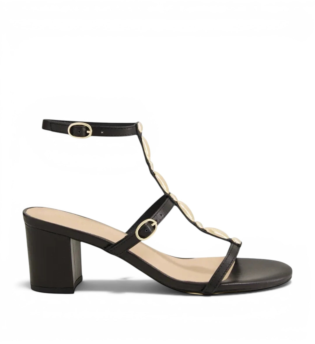 House of Florian Glimery black block heel sandals with gold circular embellishments and an adjustable ankle strap.