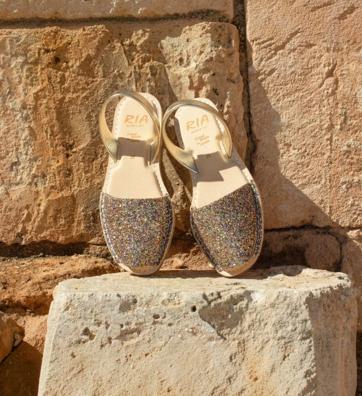 House of Florian Joan Avarcas sandals with glitter confetti toe and gold slingback straps. Handmade Spanish leather.