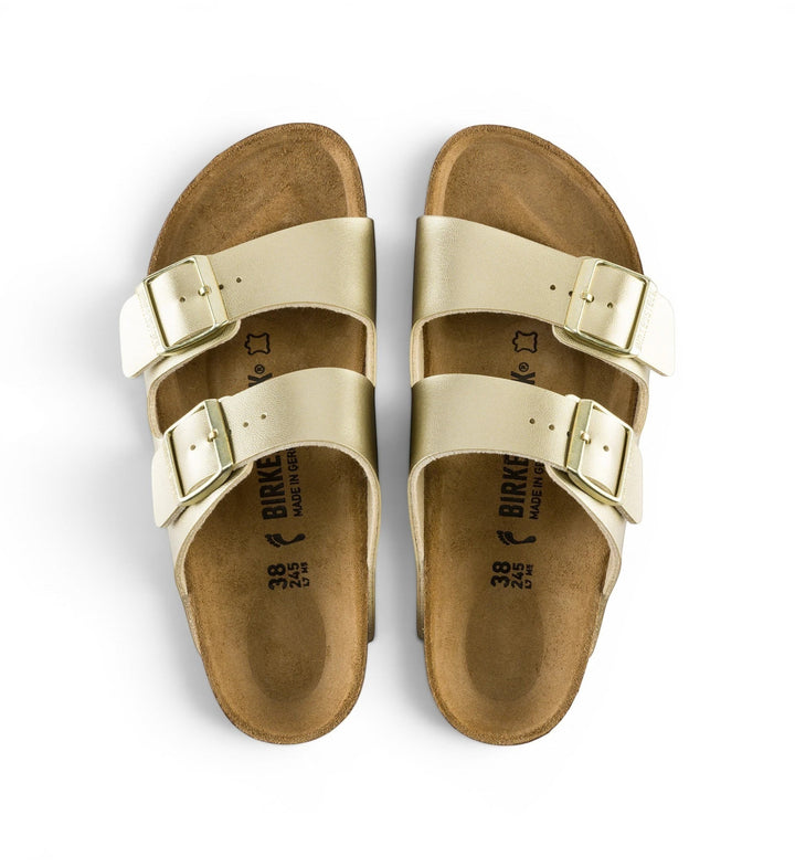 House of Florian Arizona metallic gold Birko-Flor sandals with two adjustable buckle straps and cork footbed.