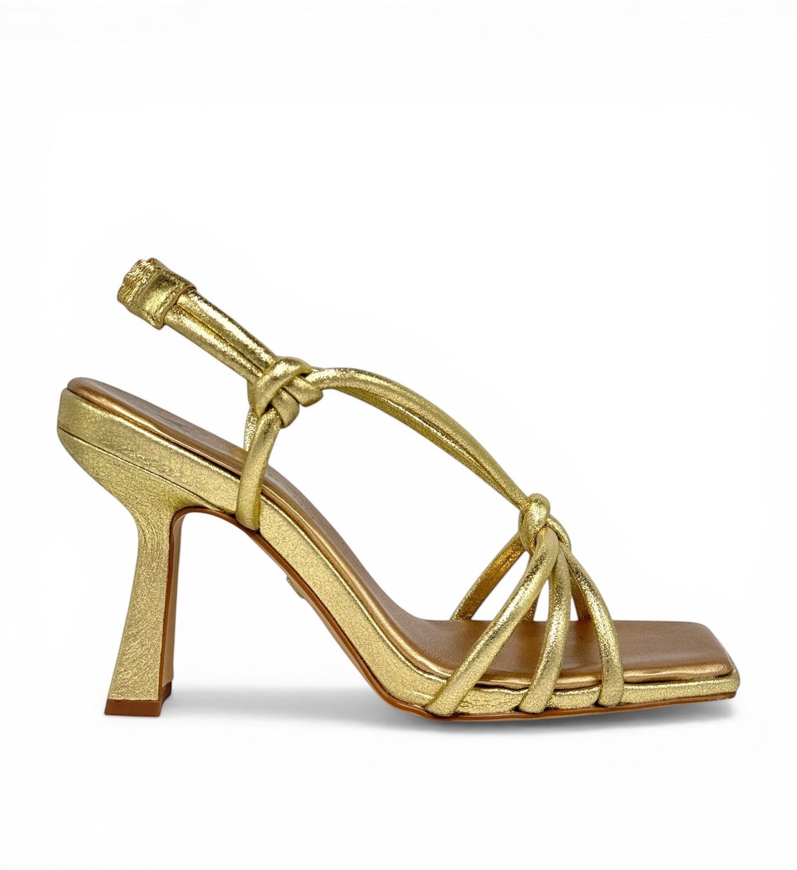 House of Florian gold metallic knotted strap square toe heeled sandals.