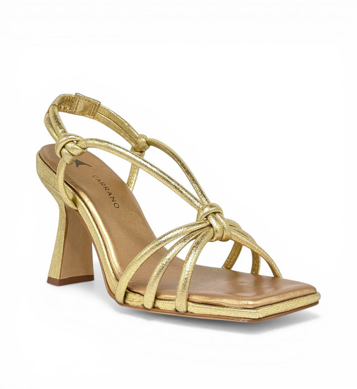 House of Florian gold metallic strappy heeled sandals with knotted detail and square toe.