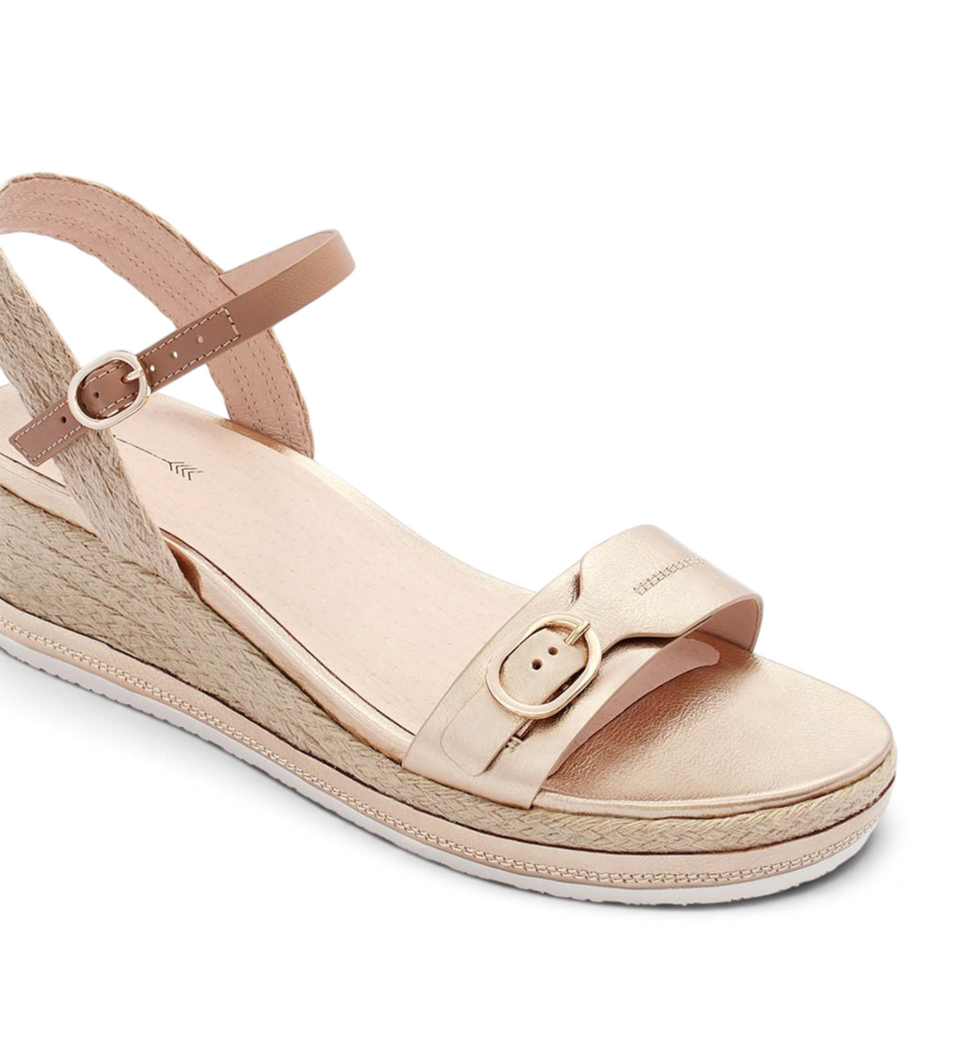 House of Florian Halle soft gold tumbled leather wedge sandal with an espadrille trim and adjustable buckle strap.