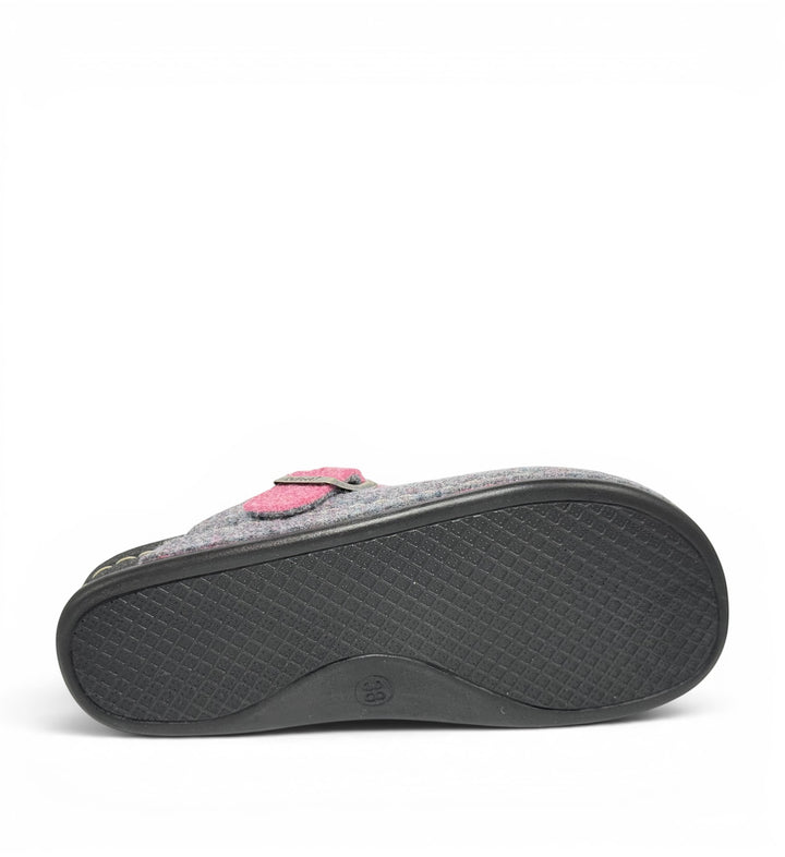House of Florian Dr Feet Honey Heather grey wool slipper with a pink strap and black textured rubber sole, side view