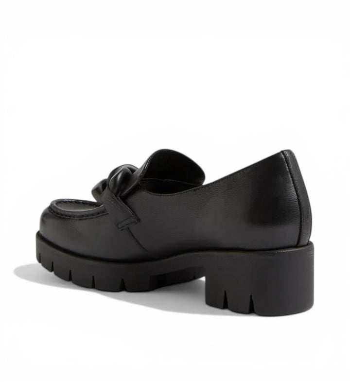 House of Florian Hanini black leather loafers with a decorative knot detail and chunky lug sole.
