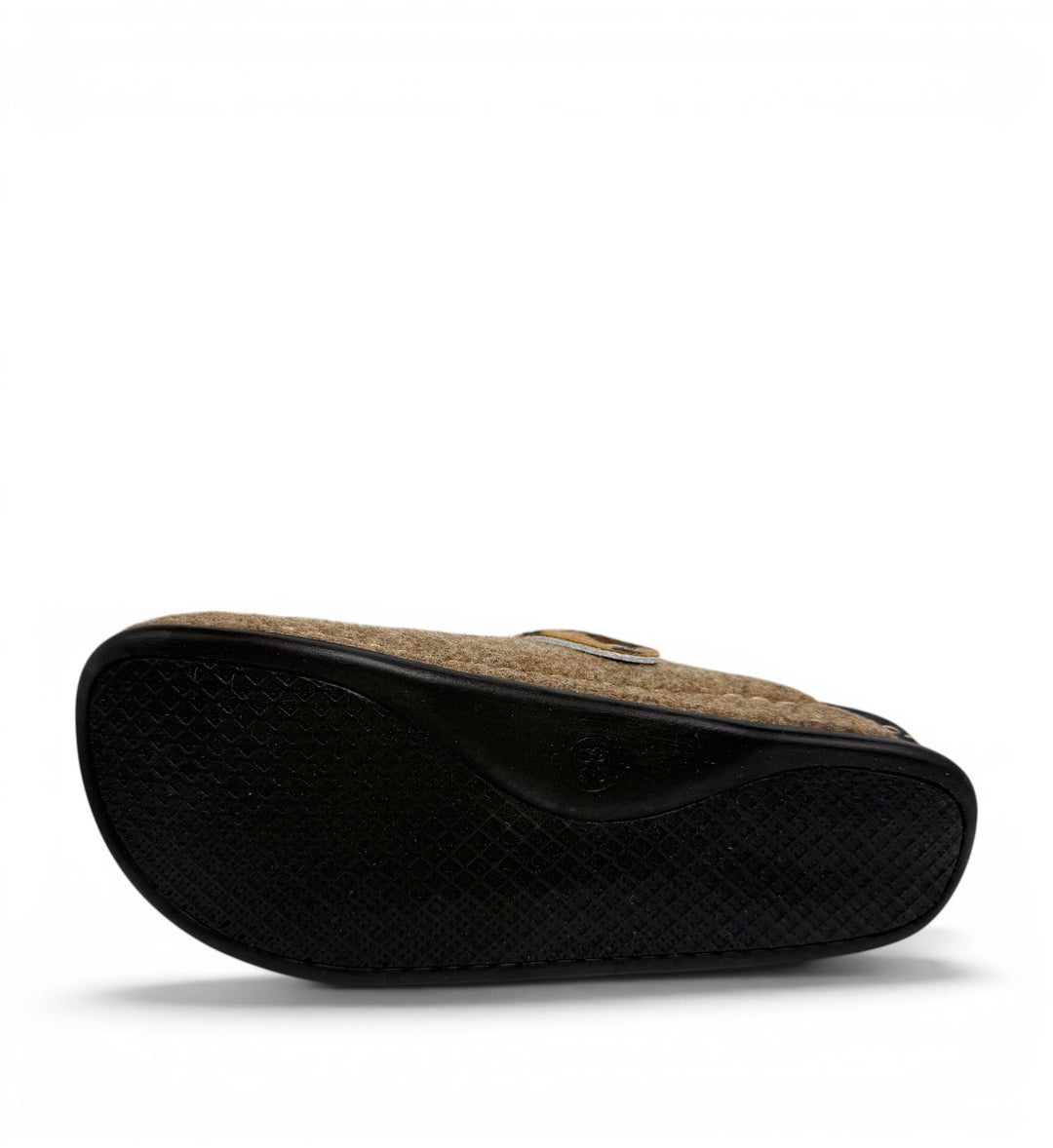 House of Florian Dr Feet  Honey Camel slipper showing the textured black rubber sole and brown felt upper