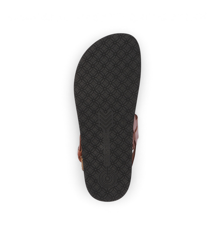 House of Florian Hunter Rich Tan sandal showing the black textured rubber sole with geometric pattern