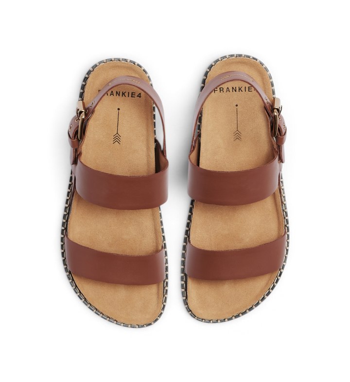 House of Florian Hunter sandals in rich tan leather with double straps, buckled ankle strap, and espadrille trim.