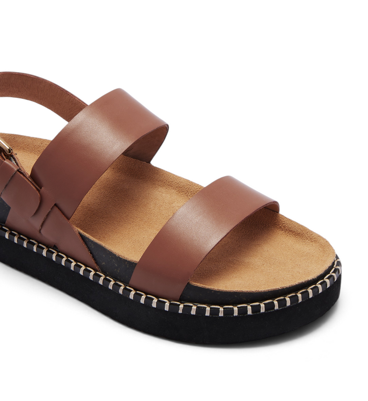 House of Florian Hunter Rich Tan leather sandal with a thick black platform sole and contrast whipstitch detailing.