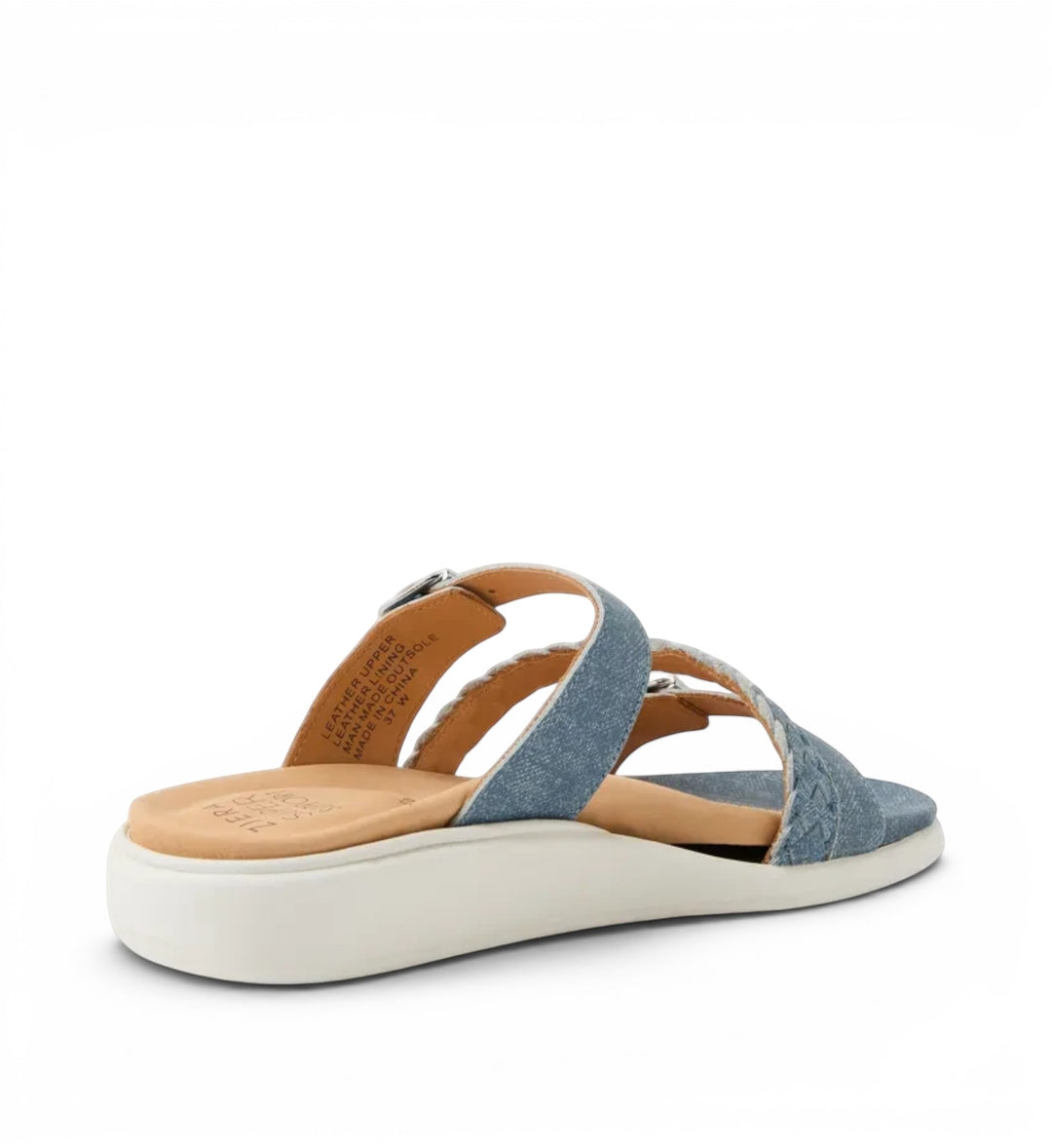 House of Florian Ianna W blue denim sandals with woven strap detail, tan leather footbed, and white platform sole.