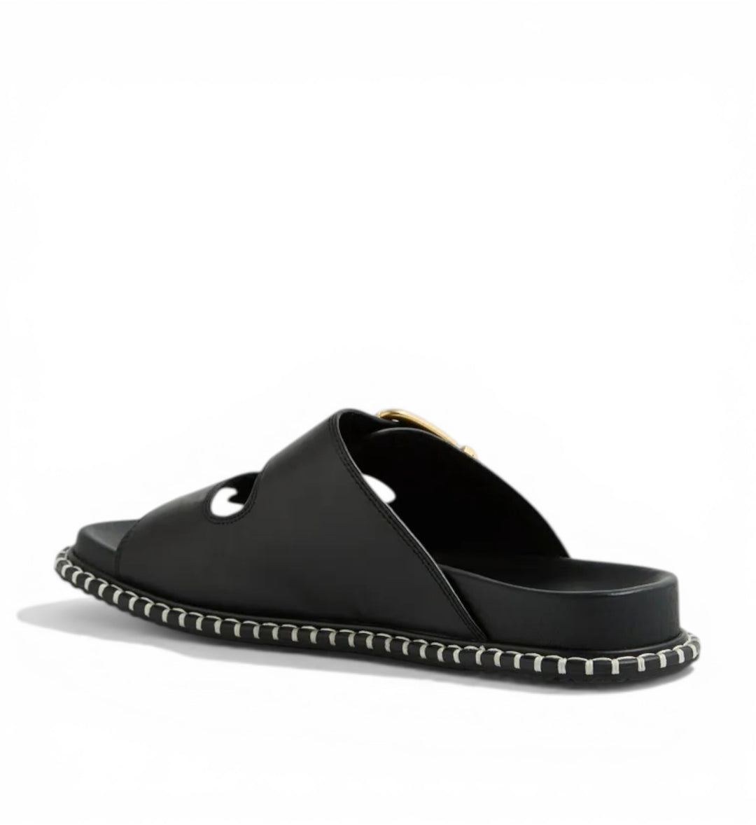 House of Florian Iyami W Black leather slide sandals with a gold buckle and decorative stitching.