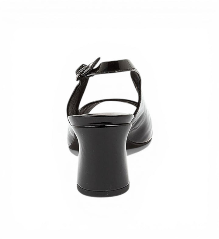 House of Florian Jianas black patent leather slingback heels with ankle strap and buckle detail.