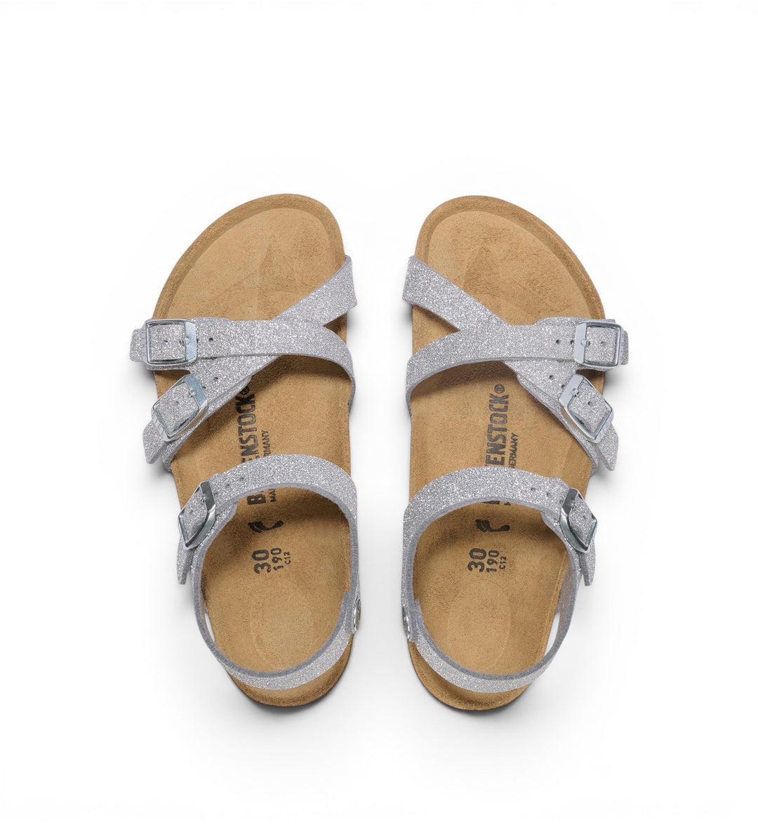 House of Florian Kumba Kids synthetic glitter silver sandals with criss-cross straps and buckle closures.