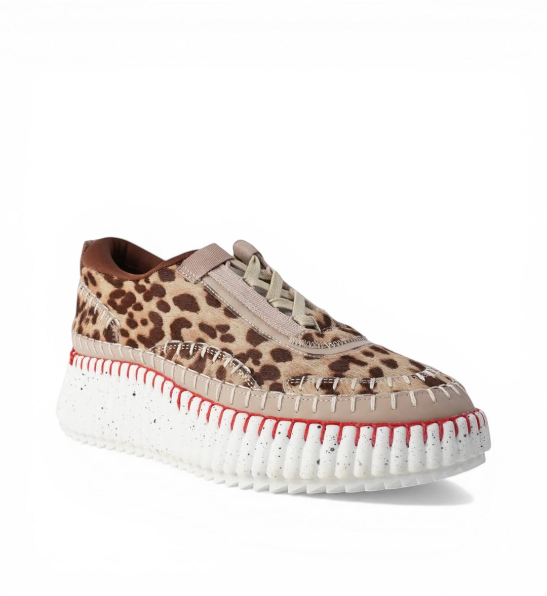 House of Florian Copen Leopard sneakers with a leopard print pony hair upper, beige laces, and a chunky white sole with red stitching.