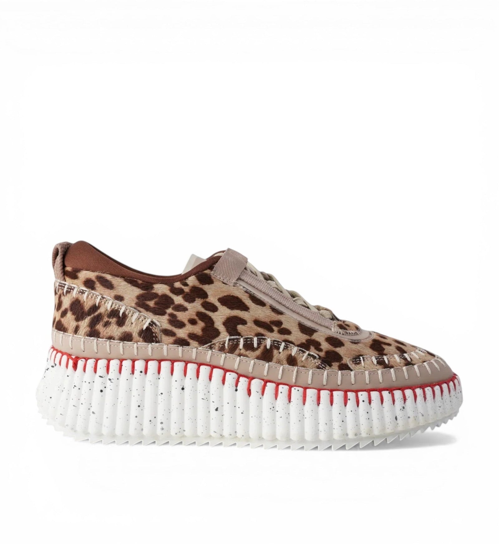 House of Florian Copen Leopard sneakers with brown leopard print pony hair and a white speckled platform sole with red stitching.
