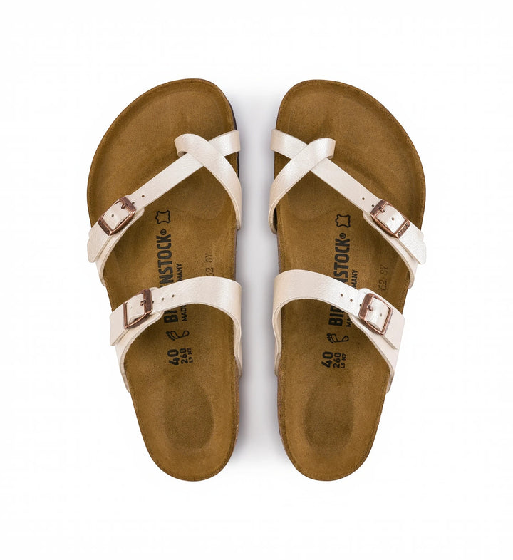 House of Florian Mayari pearl white Birko-Flor sandals with crisscross straps and adjustable buckles.
