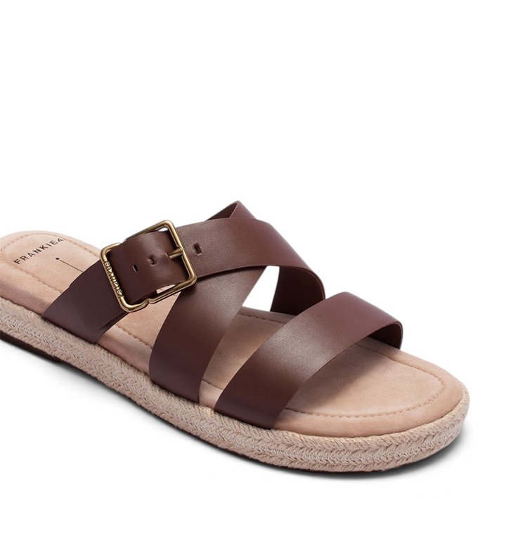 House of Florian Micah deep tan leather slide sandals with crisscross straps and a gold buckle on a jute sole