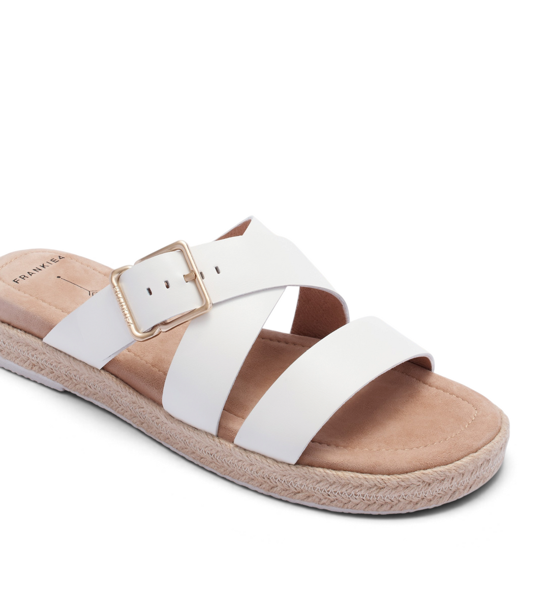 House of Florian Micah soft white slide sandals with crisscross leather straps and a gold buckle on a jute sole