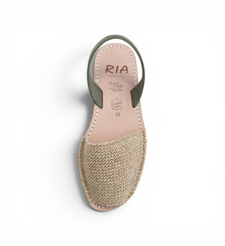 House of Florian natural woven avarcas sandals with green leather straps and leather soles.