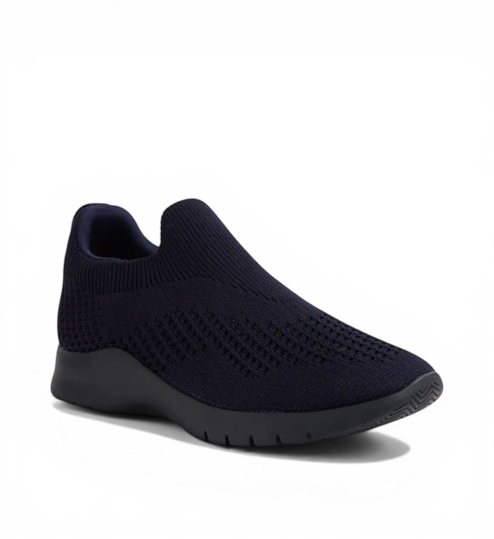 ZIERA navy knit slip-on sneakers with a textured toe box and cushioned sole.