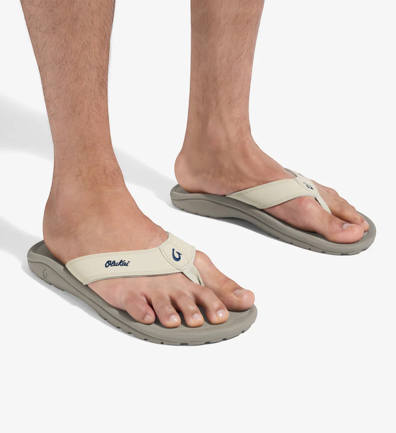 House of Florian Olukai Ohana Mens Tapa Clay flip-flops with beige straps and grey soles.