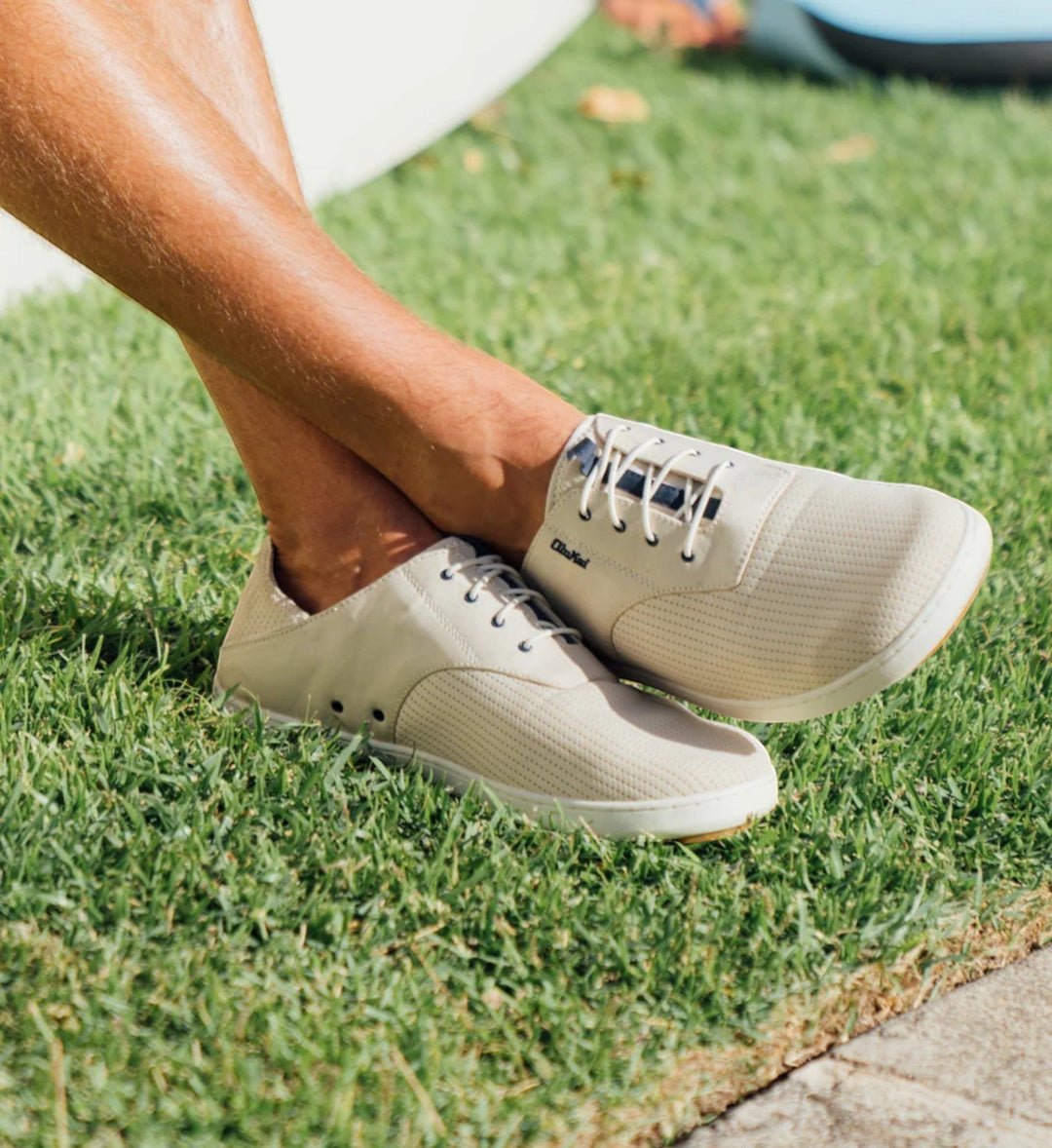 House of Florian Olukai Nohea Moku Mens Tapa light beige perforated leather sneakers with white laces.