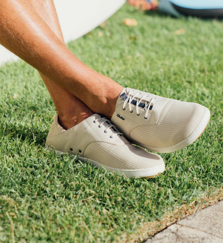 House of Florian Olukai Nohea Moku Mens Tapa light beige perforated leather sneakers with white laces.
